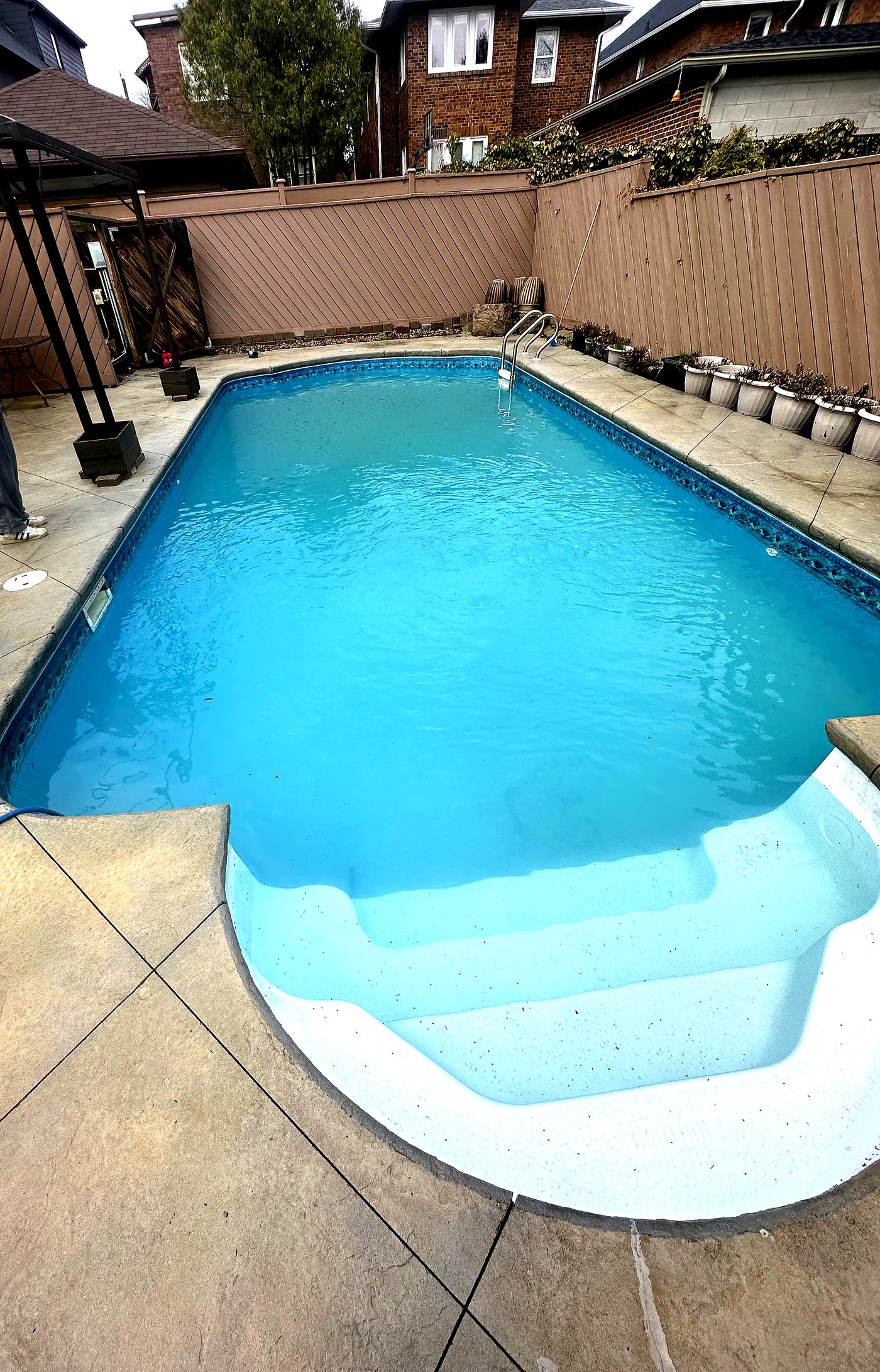 Clean outdoor pool after opening